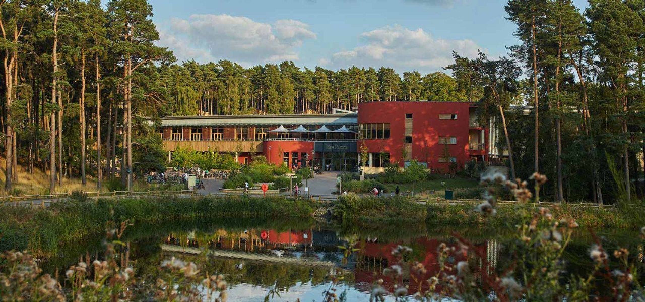Woburn lake with a view of the Sports Plaza in the distance