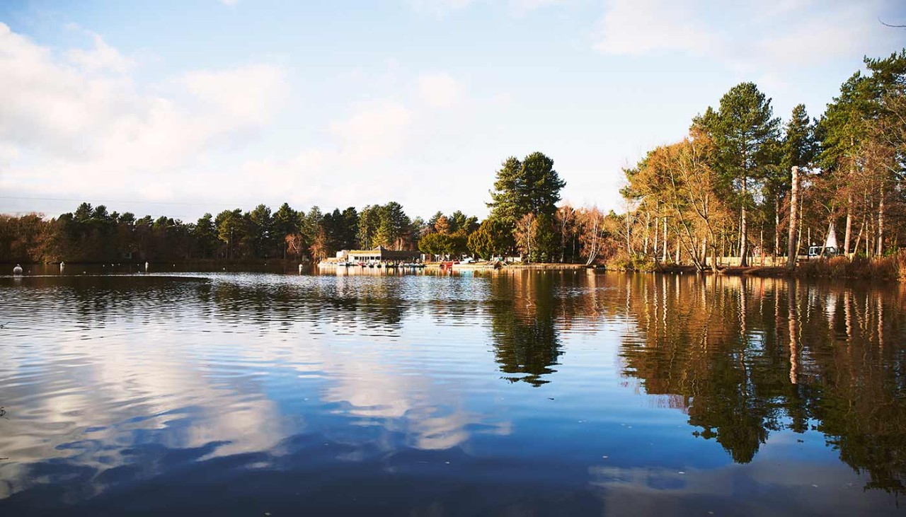 A view of the lake with the boathouse in the background