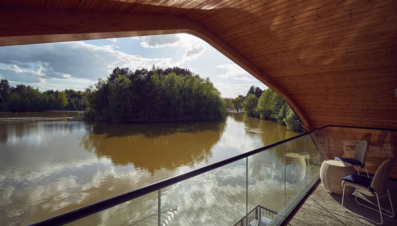 view of Elveden Lake from the balcony of a Waterside Lodge