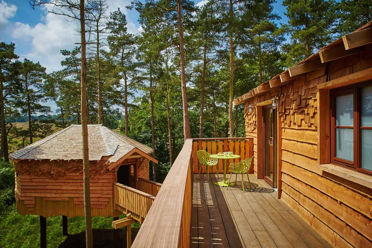 Balcony area of tree house with view of the games pod from it 