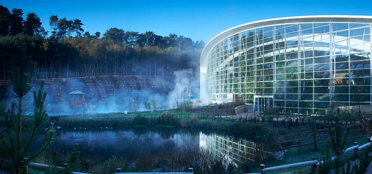 Exterior of the Subtropical Swimming Paradise at Woburn with steam rising from the rapids