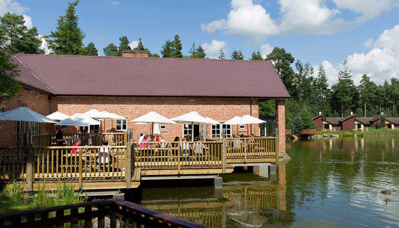 View of decking area and Lakeside Inn overlooking the main lake